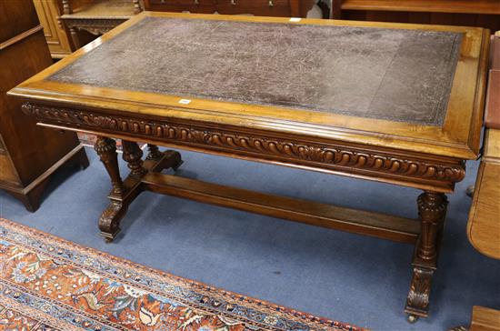 A mid Victorian carved walnut Renaissance style library table, W.148cm